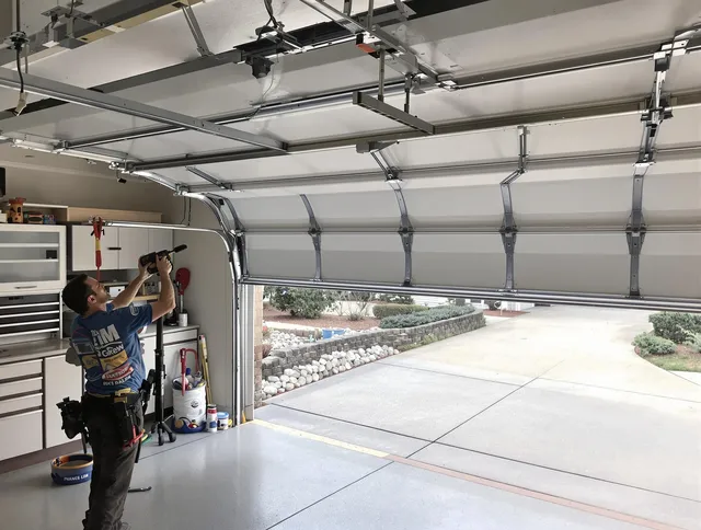Garage door track repair service by Kendale Lakes Garage Door Repair in Kendale Lakes